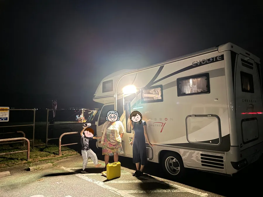 Neko Van family campervan parked at night in Japan
