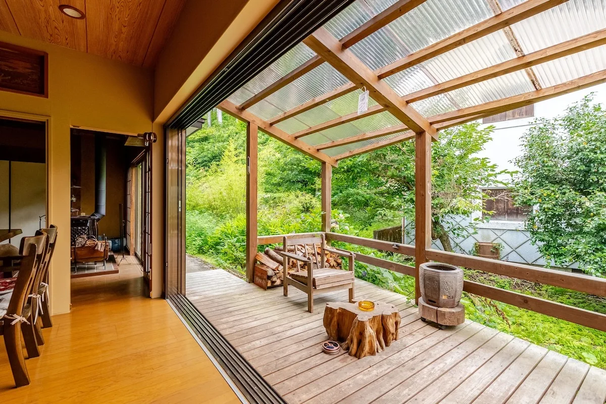 The riverside deck at Yamaneko Lodge in Shirotori, Gifu